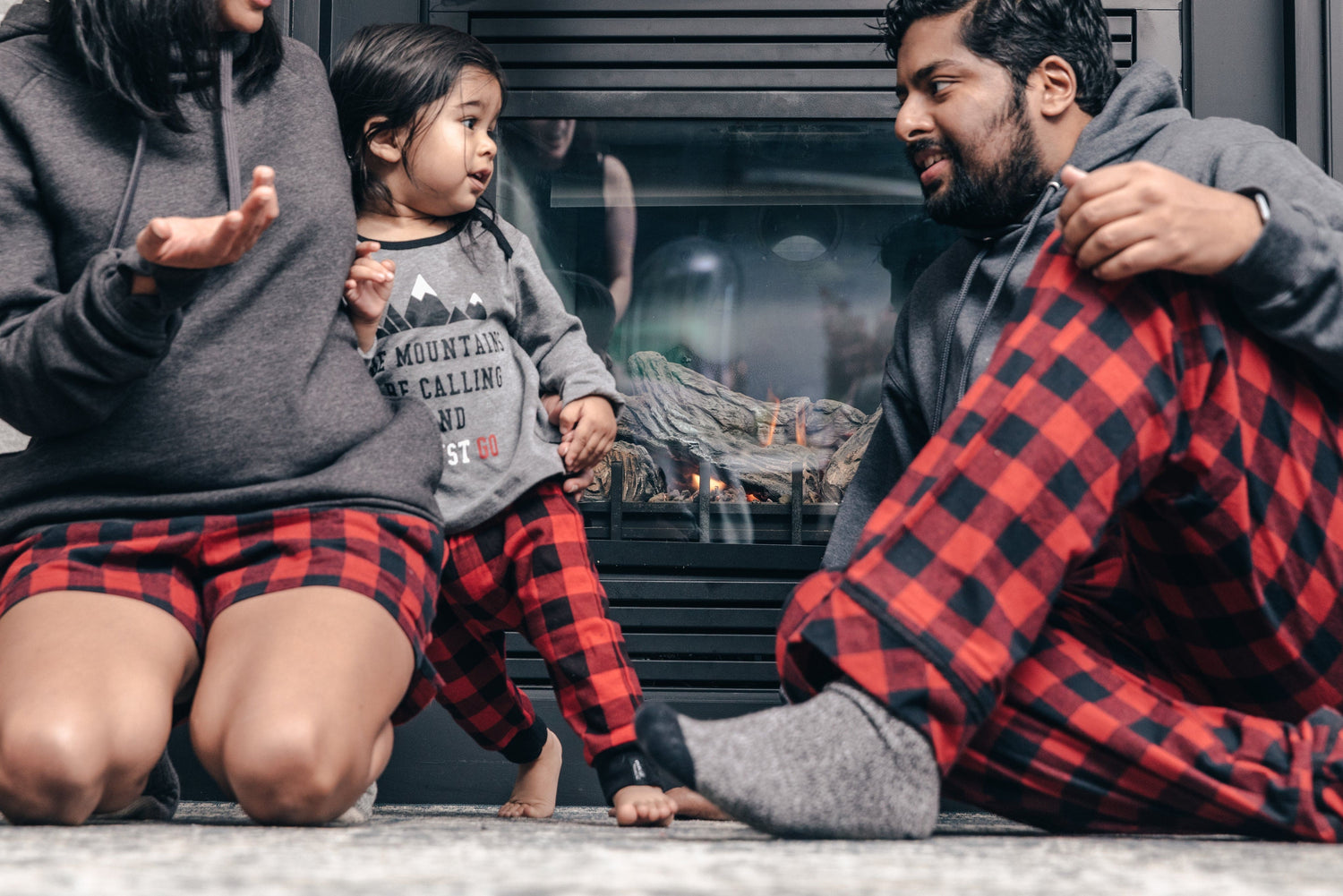 family relaxing together in pjs