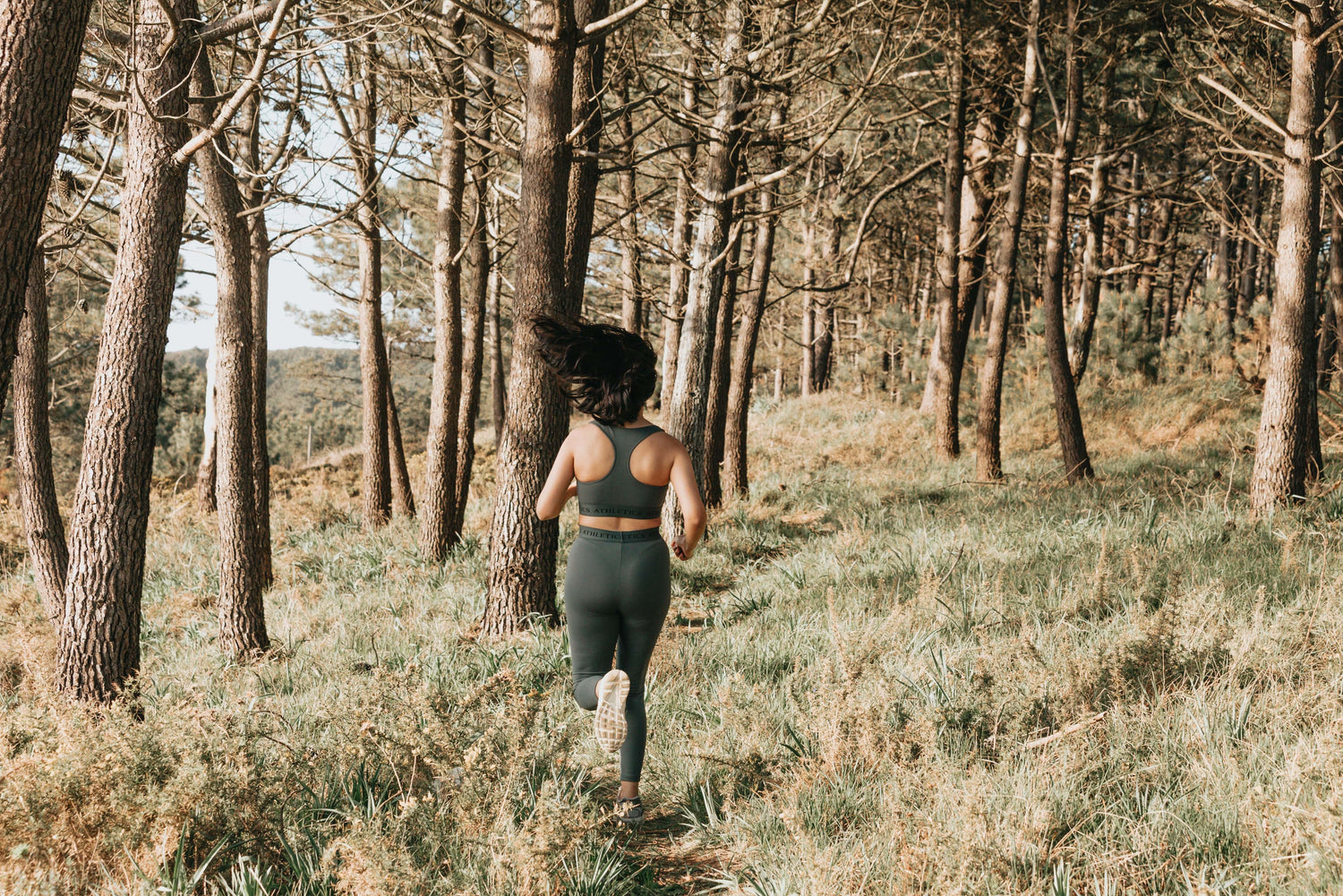 woman trail running